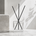 Minimal Glass Reed Diffuser by Mioriva in a quiet home setting