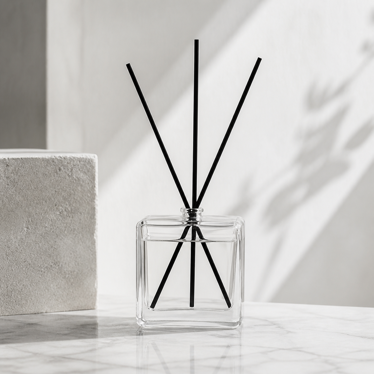 Minimal Glass Reed Diffuser by Mioriva in a quiet home setting